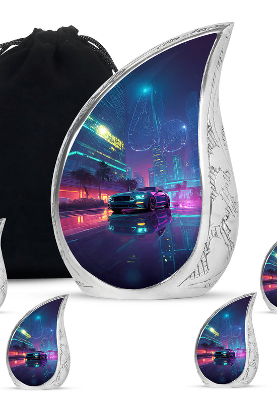 Misty Blue Car Cremation Urn side profile showing urn shape - rounded teardrop car design with delicate detail - memorial set with one large and four small urns