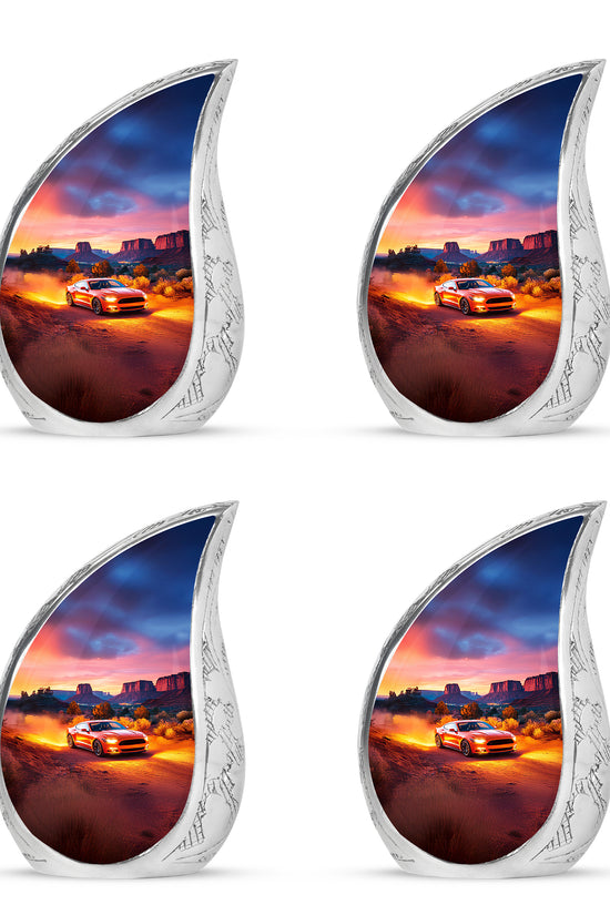 Fiery Red Car Cremation Urn close-up of engraving and surface detail - graceful tear-shaped urn with car motif - 10 inch aluminum urn for cremated remains