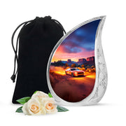 Crimson Red Car Cremation Urn front view showing detailed design - flowing teardrop car silhouette on curved aluminum - full-size 10 inch 200 cubic inch adult cremation urn