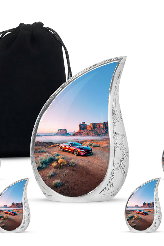 Sterling Silver Car Cremation Urn side profile showing urn shape - rounded teardrop car design with delicate detail - memorial set with one large and four small urns