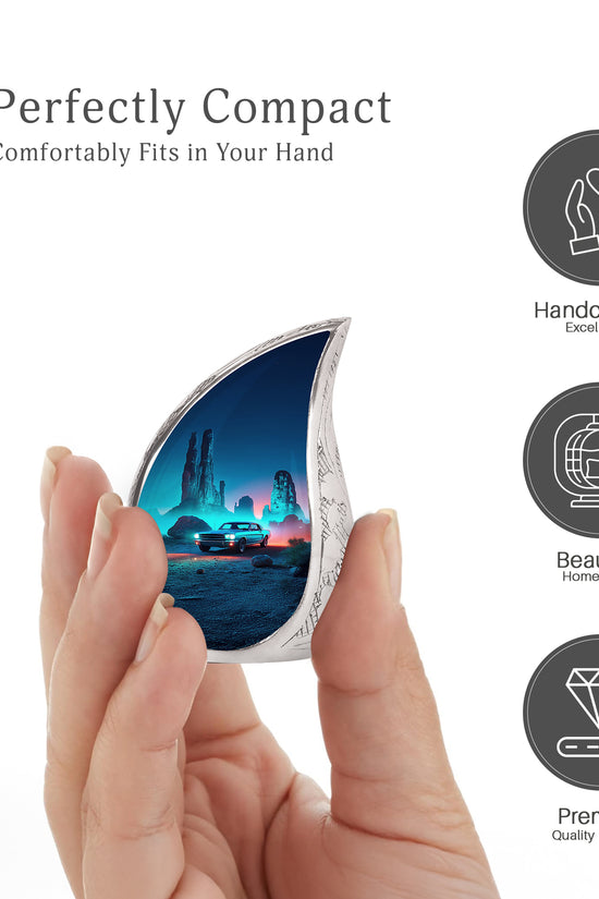 Sky Blue Car Cremation Urn angled view of lid and engraved motif - flowing teardrop car silhouette on curved aluminum - mini keepsake memorial for portion of cremation ashes
