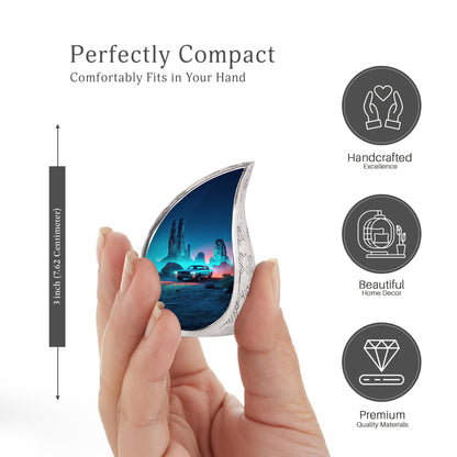 Sky Blue Car Cremation Urn angled view of lid and engraved motif - flowing teardrop car silhouette on curved aluminum - mini keepsake memorial for portion of cremation ashes