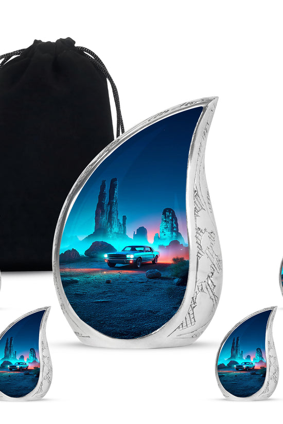 Misty Blue Car Cremation Urn side profile showing urn shape - flowing teardrop car silhouette on curved aluminum - memorial set with one large and four small urns
