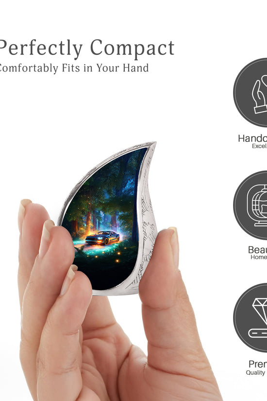 Vivid Teal Car Cremation Urn angled view of lid and engraved motif - graceful tear-shaped urn with car motif - mini keepsake memorial for portion of cremation ashes