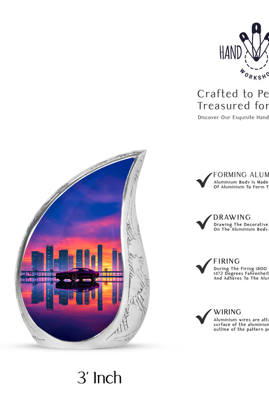 Coral Pink Car Cremation Urn angled view of lid and engraved motif - flowing teardrop car silhouette on curved aluminum - mini keepsake memorial for portion of cremation ashes