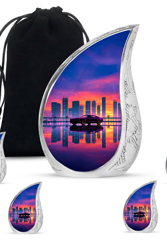 Pastel Pink Car Cremation Urn side profile showing urn shape - rounded teardrop car design with delicate detail - memorial set with one large and four small urns