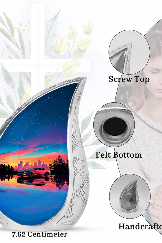 Steel Blue Car Cremation Urn angled view of lid and engraved motif - graceful tear-shaped urn with car motif - mini keepsake memorial for portion of cremation ashes