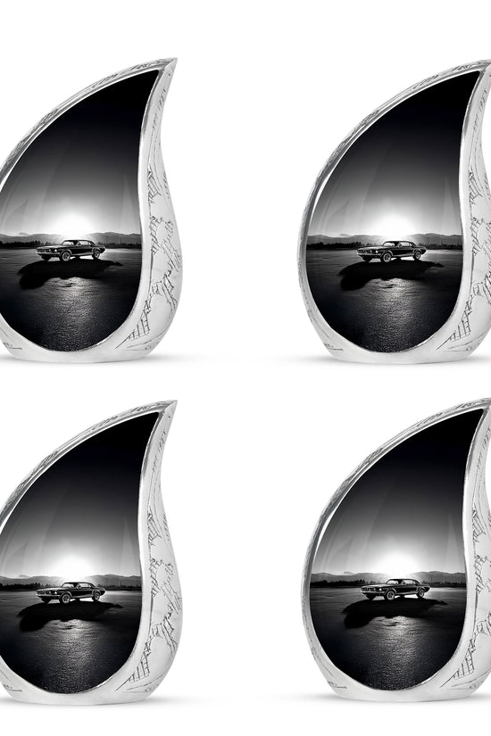 Ash Gray Car Cremation Urn close-up of engraving and surface detail - graceful tear-shaped urn with car motif - 10 inch aluminum urn for cremated remains