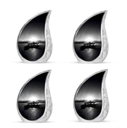 Ash Gray Car Cremation Urn close-up of engraving and surface detail - graceful tear-shaped urn with car motif - 10 inch aluminum urn for cremated remains