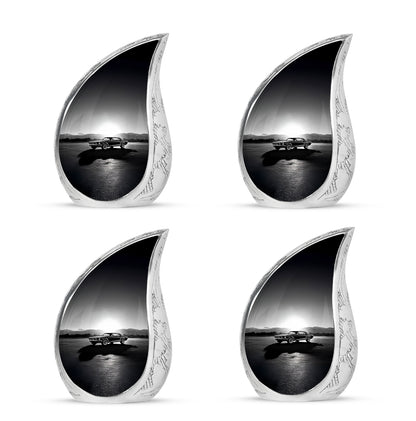 Ash Gray Car Cremation Urn close-up of engraving and surface detail - graceful tear-shaped urn with car motif - 10 inch aluminum urn for cremated remains