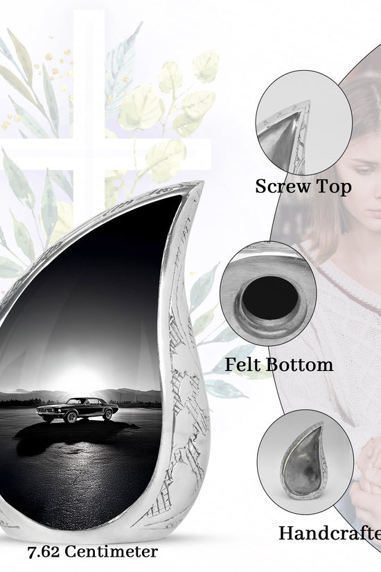 Charcoal Gray Car Cremation Urn angled view of lid and engraved motif - rounded teardrop car design with delicate detail - mini keepsake memorial for portion of cremation ashes