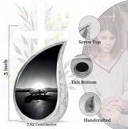 Charcoal Gray Car Cremation Urn angled view of lid and engraved motif - rounded teardrop car design with delicate detail - mini keepsake memorial for portion of cremation ashes