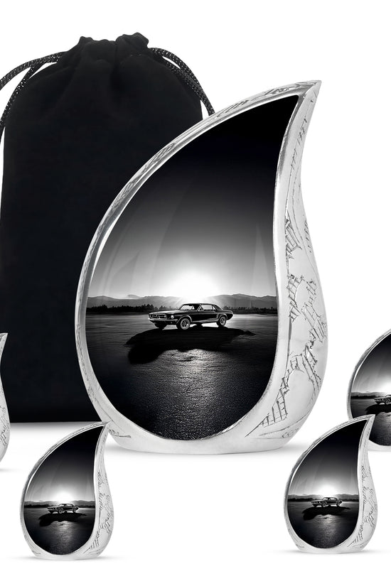 Ash Gray Car Cremation Urn side profile showing urn shape - smooth teardrop contour featuring car art - memorial set with one large and four small urns