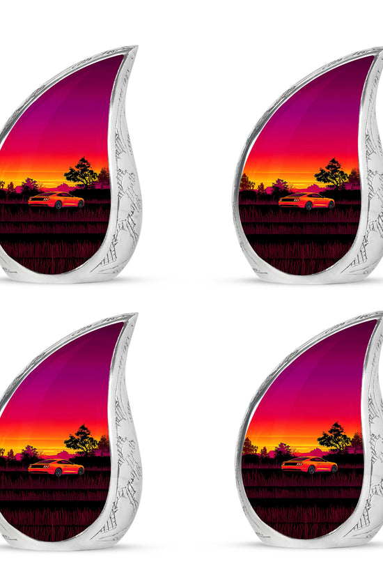 Garnet Red Car Cremation Urn close-up of engraving and surface detail - flowing teardrop car silhouette on curved aluminum - 10 inch aluminum urn for cremated remains