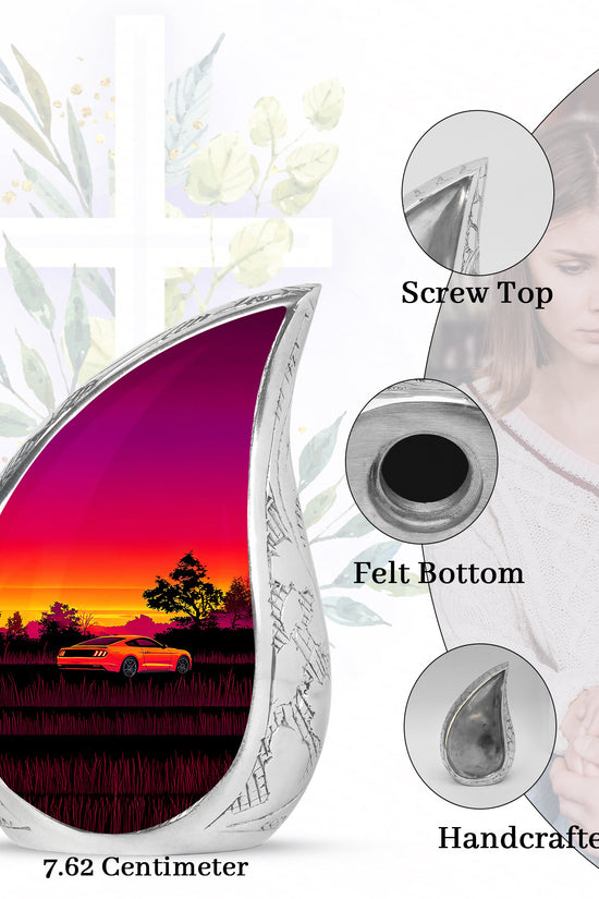 Burgundy Red Car Cremation Urn angled view of lid and engraved motif - flowing teardrop car silhouette on curved aluminum - mini keepsake memorial for portion of cremation ashes
