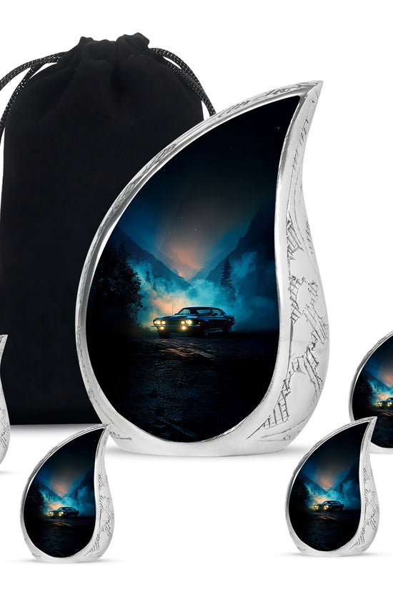 Cobalt Blue Car Cremation Urn side profile showing urn shape - graceful tear-shaped urn with car motif - memorial set with one large and four small urns