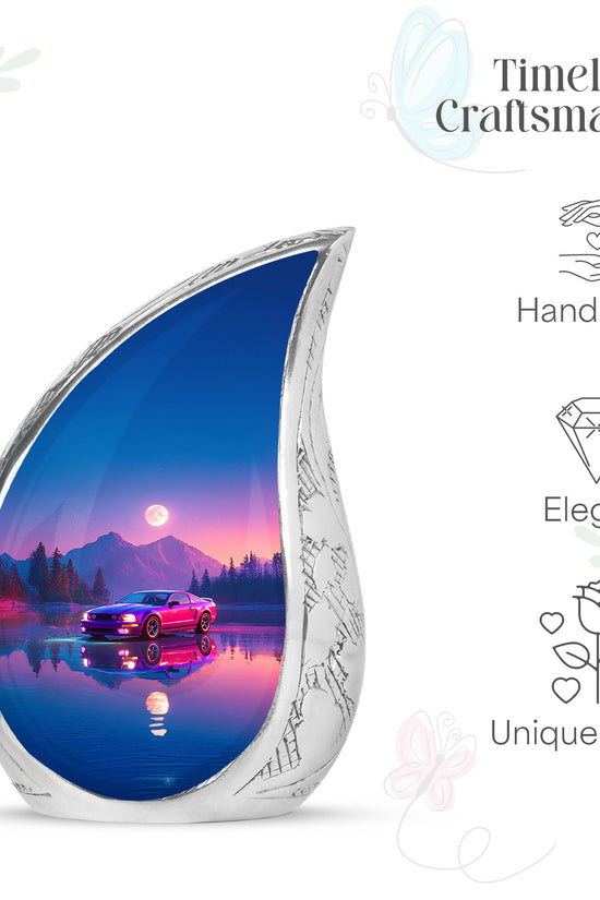 Misty Blue Car Cremation Urn angled view of lid and engraved motif - rounded teardrop car design with delicate detail - mini keepsake memorial for portion of cremation ashes