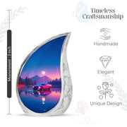 Misty Blue Car Cremation Urn angled view of lid and engraved motif - rounded teardrop car design with delicate detail - mini keepsake memorial for portion of cremation ashes