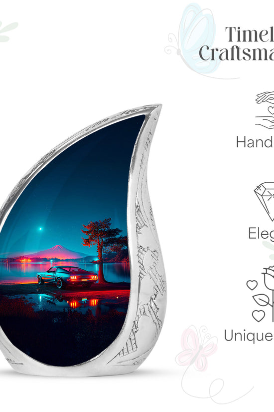 Icy Blue Car Cremation Urn angled view of lid and engraved motif - rounded teardrop car design with delicate detail - mini keepsake memorial for portion of cremation ashes