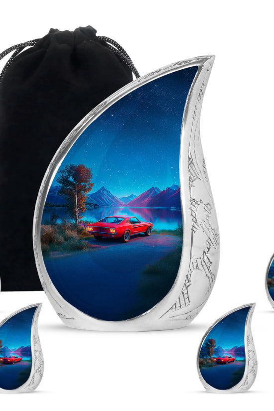 Indigo Car Cremation Urn side profile showing urn shape - rounded teardrop car design with delicate detail - memorial set with one large and four small urns