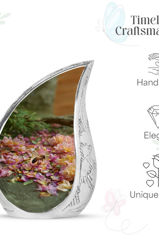 Antique Gold Bee Cremation Urn angled view of lid and engraved motif - flowing teardrop bee silhouette on curved aluminum - mini keepsake memorial for portion of cremation ashes