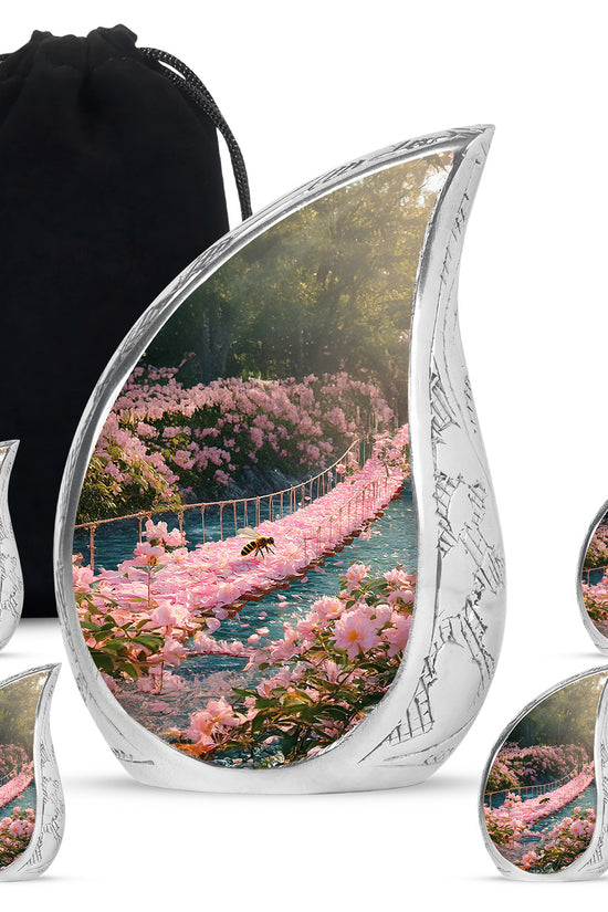 Royal Gold Bee Cremation Urn side profile showing urn shape - graceful tear-shaped urn with bee motif - memorial set with one large and four small urns