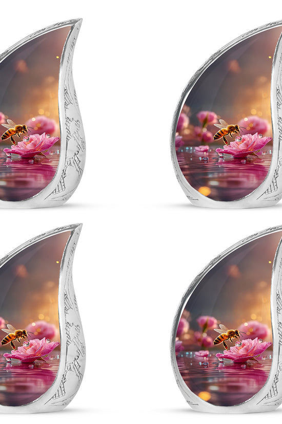 Sunrise Gold Bee Cremation Urn close-up of engraving and surface detail - rounded teardrop bee design with delicate detail - 10 inch aluminum urn for cremated remains
