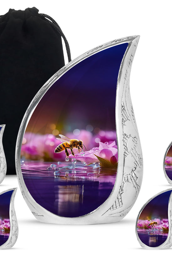 Wine Red Bee Cremation Urn side profile showing urn shape - flowing teardrop bee silhouette on curved aluminum - memorial set with one large and four small urns