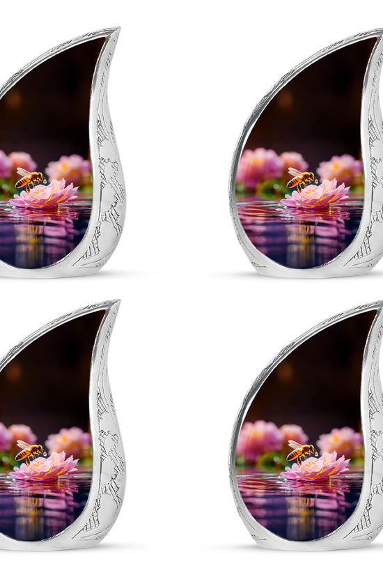 Dark Black Bee Cremation Urn close-up of engraving and surface detail - graceful tear-shaped urn with bee motif - 10 inch aluminum urn for cremated remains