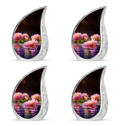 Dark Black Bee Cremation Urn close-up of engraving and surface detail - graceful tear-shaped urn with bee motif - 10 inch aluminum urn for cremated remains