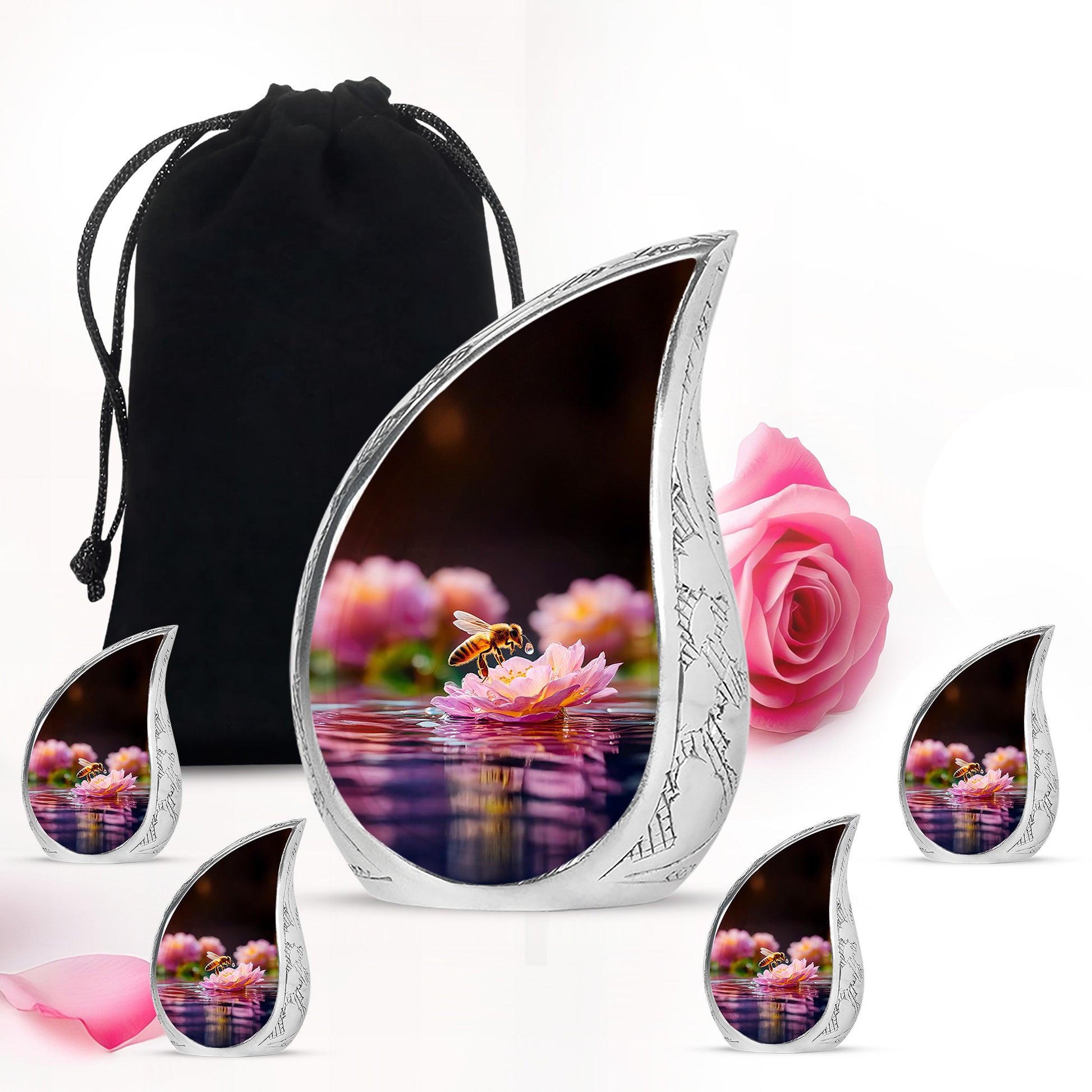 Midnight Black Bee Cremation Urn side profile showing urn shape - smooth teardrop contour featuring bee art - memorial set with one large and four small urns