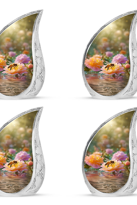 Amber Gold Bee Cremation Urn close-up of engraving and surface detail - rounded teardrop bee design with delicate detail - 10 inch aluminum urn for cremated remains