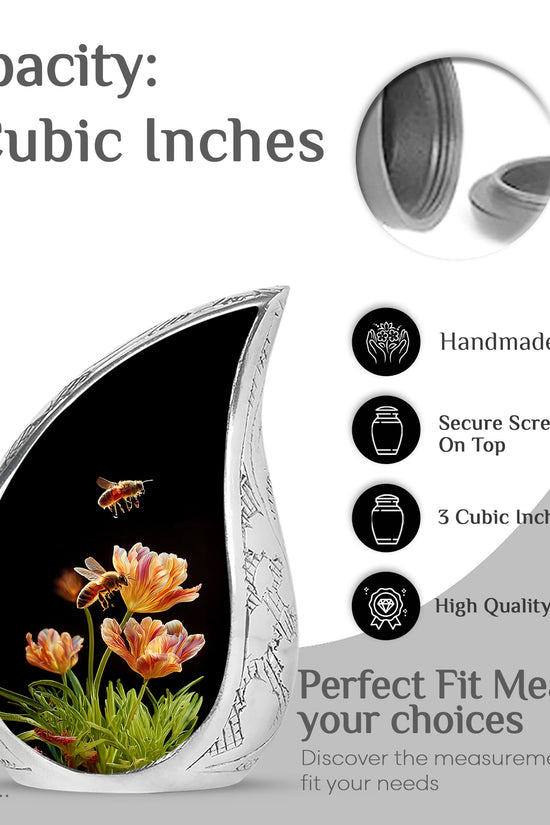 Deep Black Bee Cremation Urn angled view of lid and engraved motif - rounded teardrop bee design with delicate detail - mini keepsake memorial for portion of cremation ashes