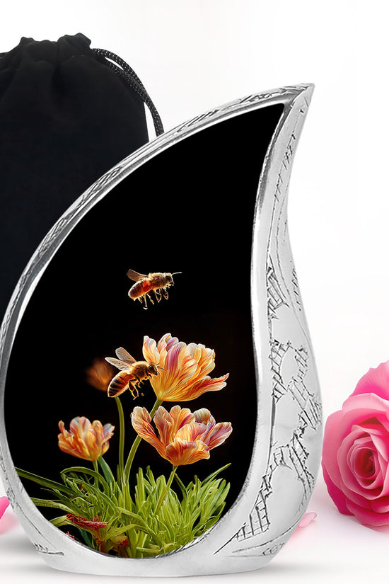 Glossy Black Bee Cremation Urn front view showing detailed design - rounded teardrop bee design with delicate detail - full-size 10 inch 200 cubic inch adult cremation urn