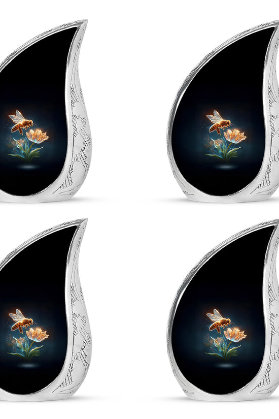 Ebony Bee Cremation Urn close-up of engraving and surface detail - flowing teardrop bee silhouette on curved aluminum - 10 inch aluminum urn for cremated remains