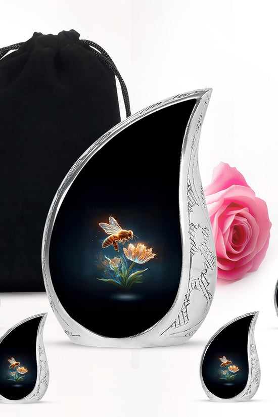 Onyx Black Bee Cremation Urn side profile showing urn shape - graceful tear-shaped urn with bee motif - memorial set with one large and four small urns