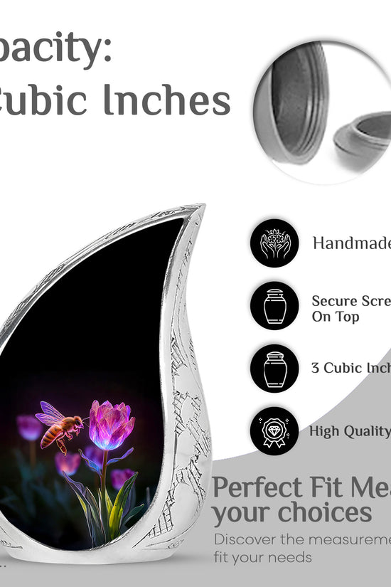 Midnight Black Bee Cremation Urn angled view of lid and engraved motif - smooth teardrop contour featuring bee art - mini keepsake memorial for portion of cremation ashes