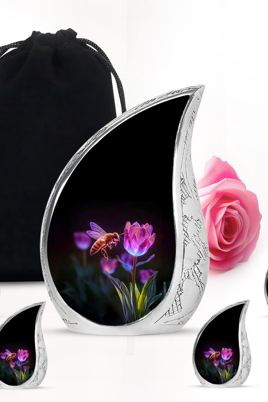 Onyx Black Bee Cremation Urn side profile showing urn shape - smooth teardrop contour featuring bee art - memorial set with one large and four small urns