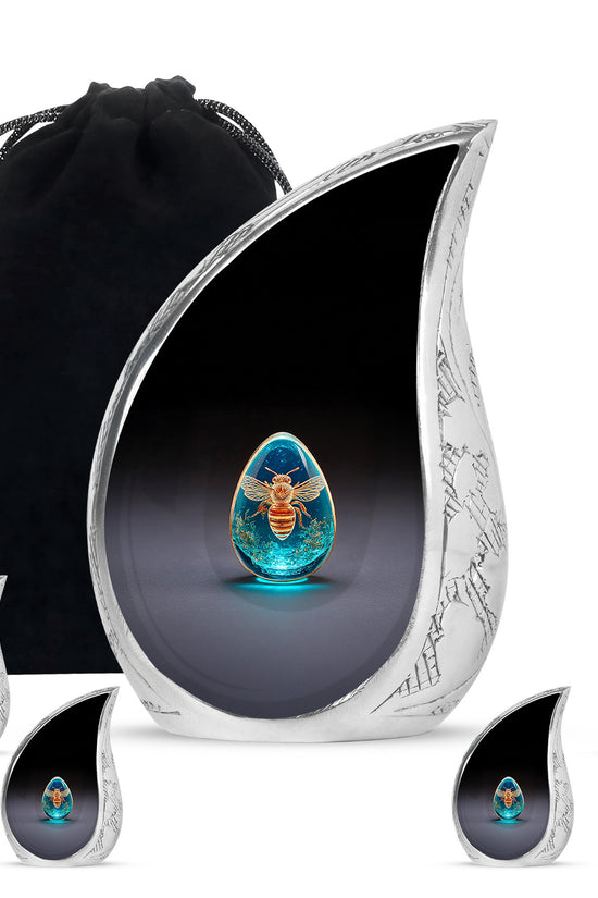 Midnight Black Bee Cremation Urn side profile showing urn shape - smooth teardrop contour featuring bee art - memorial set with one large and four small urns