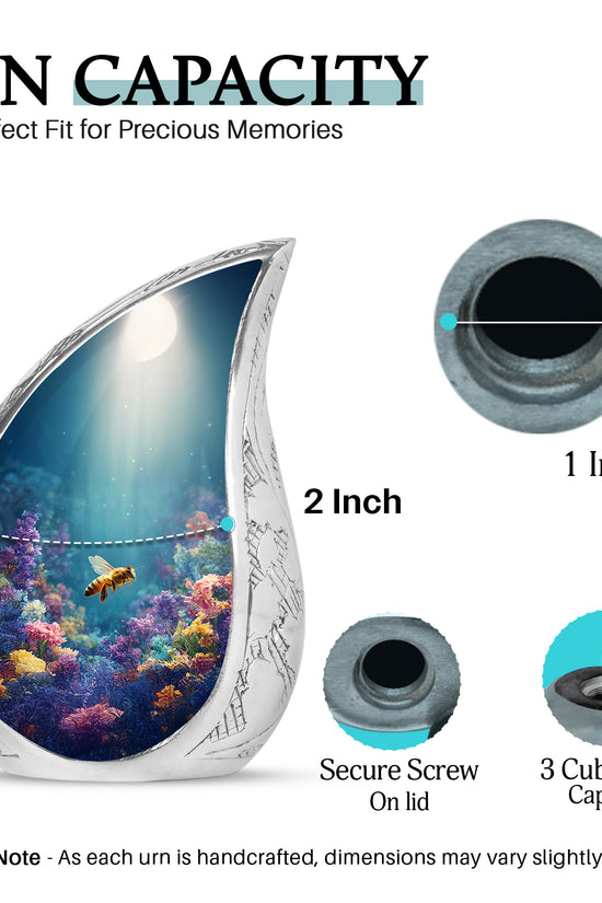 Vivid Teal Bee Cremation Urn angled view of lid and engraved motif - graceful tear-shaped urn with bee motif - mini keepsake memorial for portion of cremation ashes