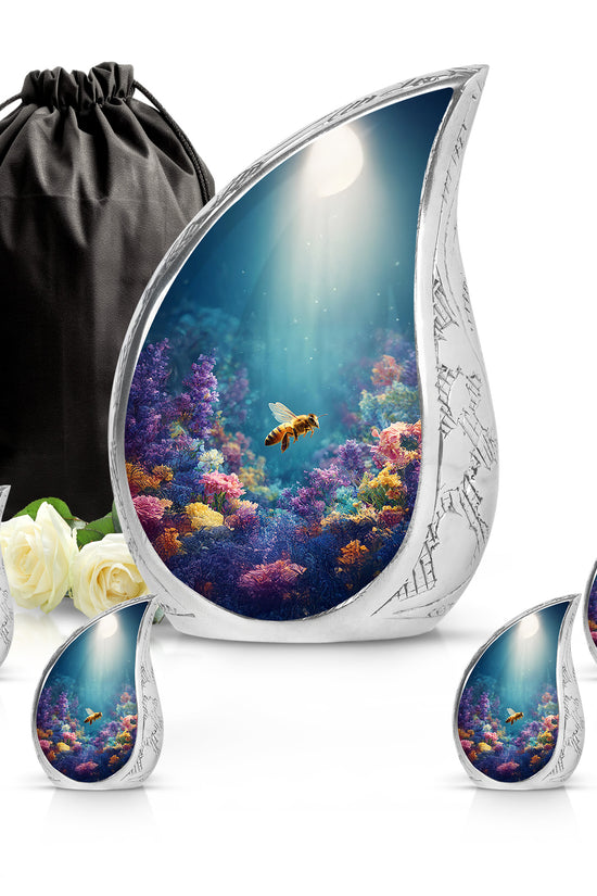 Vivid Teal Bee Cremation Urn side profile showing urn shape - graceful tear-shaped urn with bee motif - memorial set with one large and four small urns