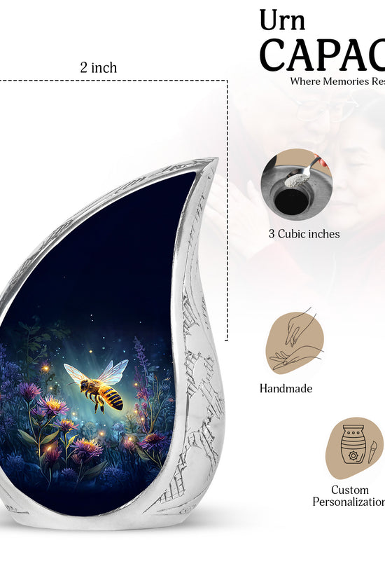Misty Blue Bee Cremation Urn angled view of lid and engraved motif - rounded teardrop bee design with delicate detail - mini keepsake memorial for portion of cremation ashes
