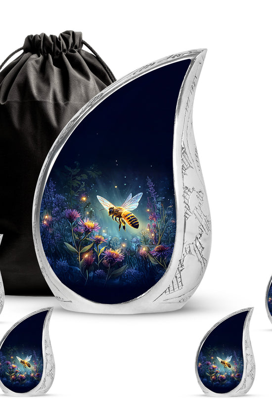 Powder Blue Bee Cremation Urn side profile showing urn shape - rounded teardrop bee design with delicate detail - memorial set with one large and four small urns