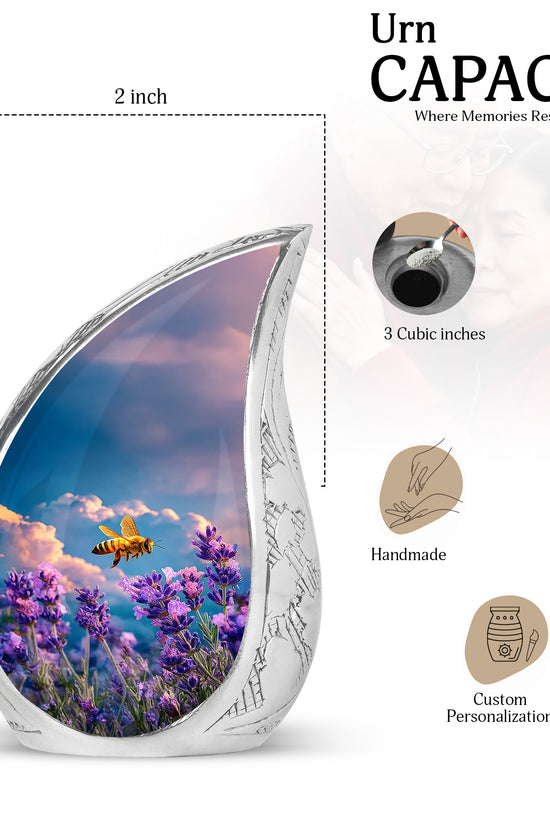 Bright Blue Bee Cremation Urn angled view of lid and engraved motif - graceful tear-shaped urn with bee motif - mini keepsake memorial for portion of cremation ashes