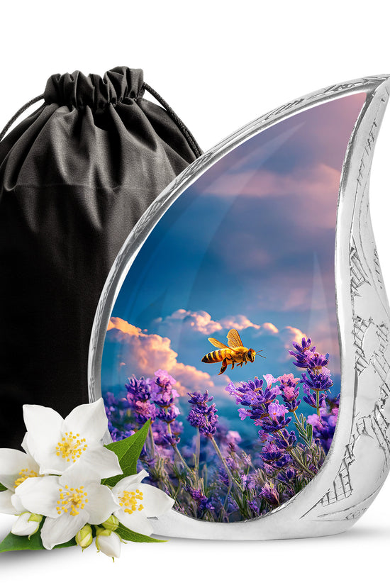 Slate Blue Bee Cremation Urn front view showing detailed design - flowing teardrop bee silhouette on curved aluminum - full-size 10 inch 200 cubic inch adult cremation urn