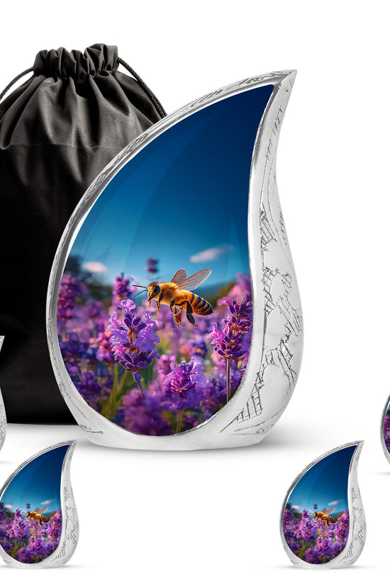 Soft Blue Bee Cremation Urn side profile showing urn shape - smooth teardrop contour featuring bee art - memorial set with one large and four small urns