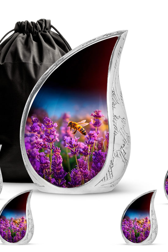 Celestial Blue Bee Cremation Urn side profile showing urn shape - rounded teardrop bee design with delicate detail - memorial set with one large and four small urns