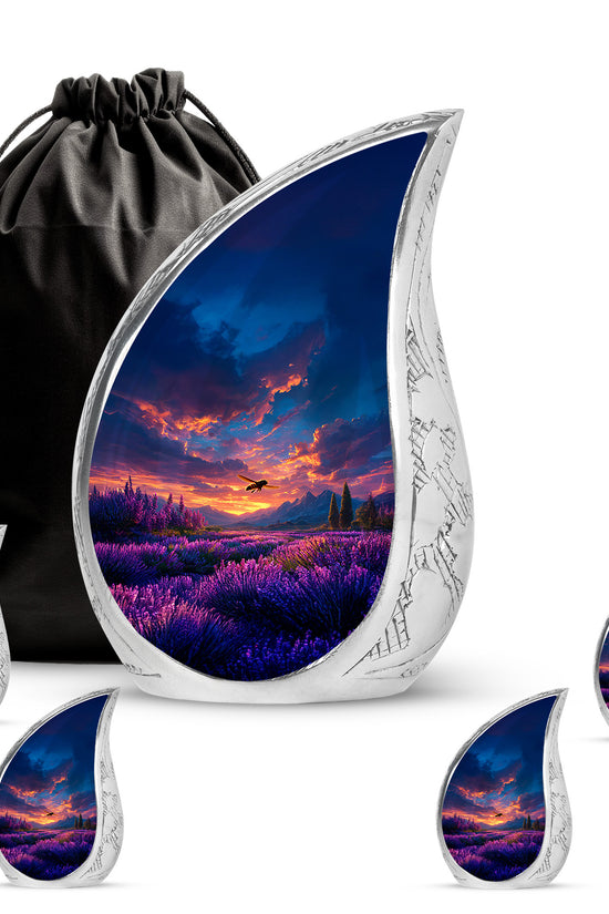 Misty Blue Bee Cremation Urn side profile showing urn shape - rounded teardrop bee design with delicate detail - memorial set with one large and four small urns
