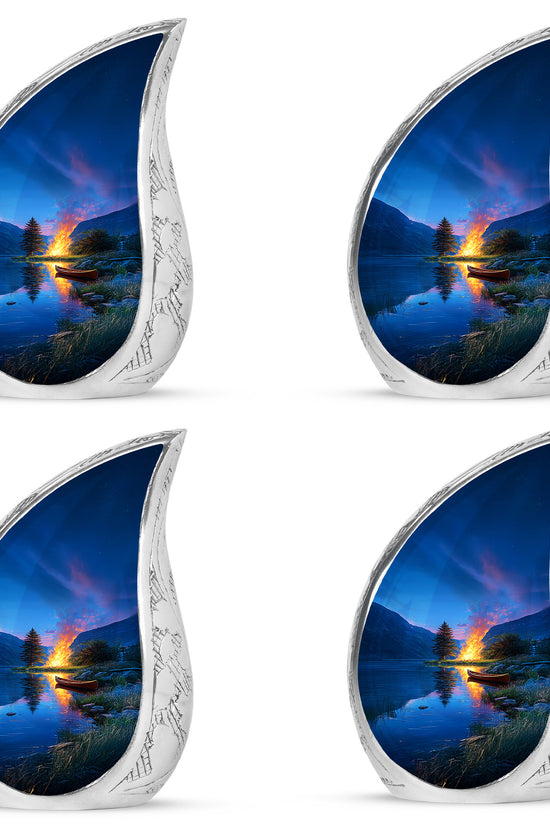 Calming Blue Campfire Cremation Urn close-up of engraving and surface detail - smooth teardrop contour featuring campfire art - 10 inch aluminum urn for cremated remains