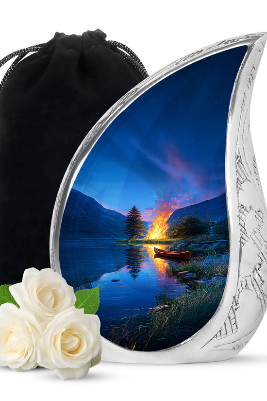 Azure Campfire Cremation Urn front view showing detailed design - flowing teardrop campfire silhouette on curved aluminum - full-size 10 inch 200 cubic inch adult cremation urn